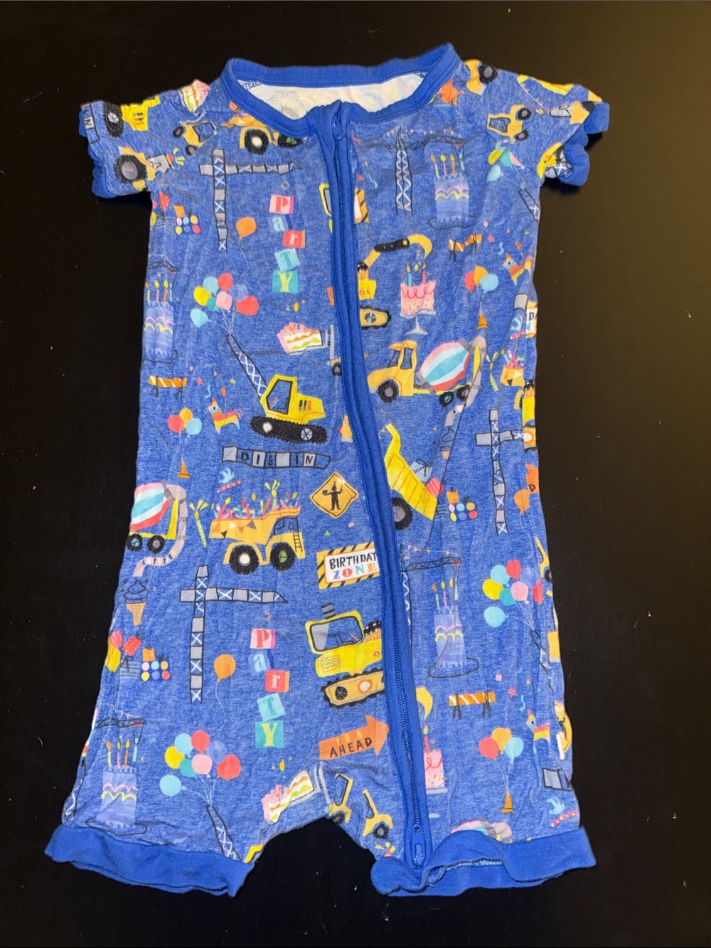 Little Sleepies Blue Zip Romper with Construction & Party Motifs